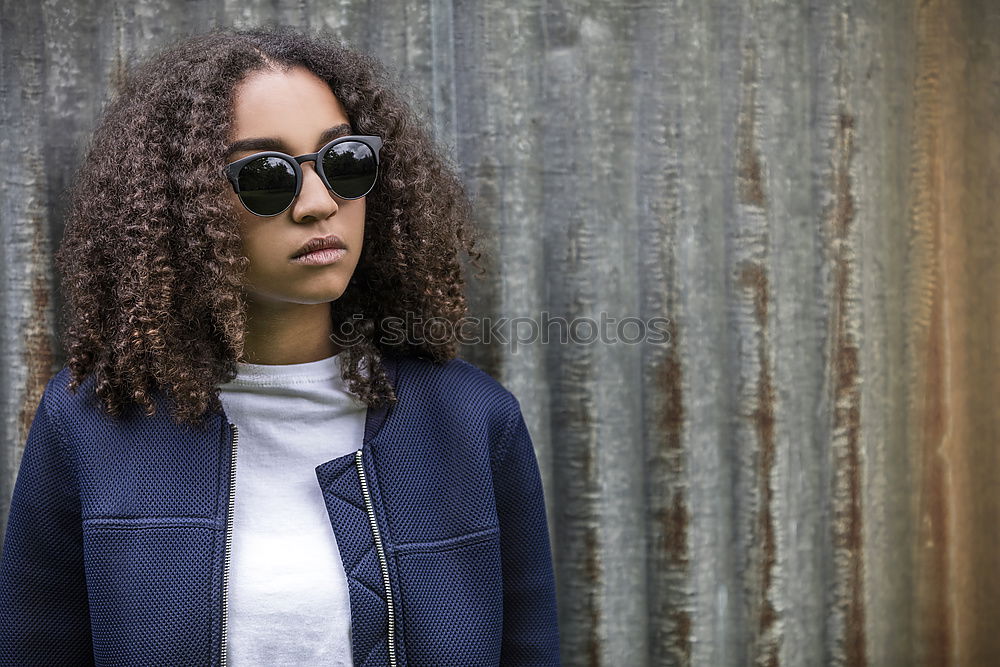 Similar – Image, Stock Photo Stylish woman posing at fence