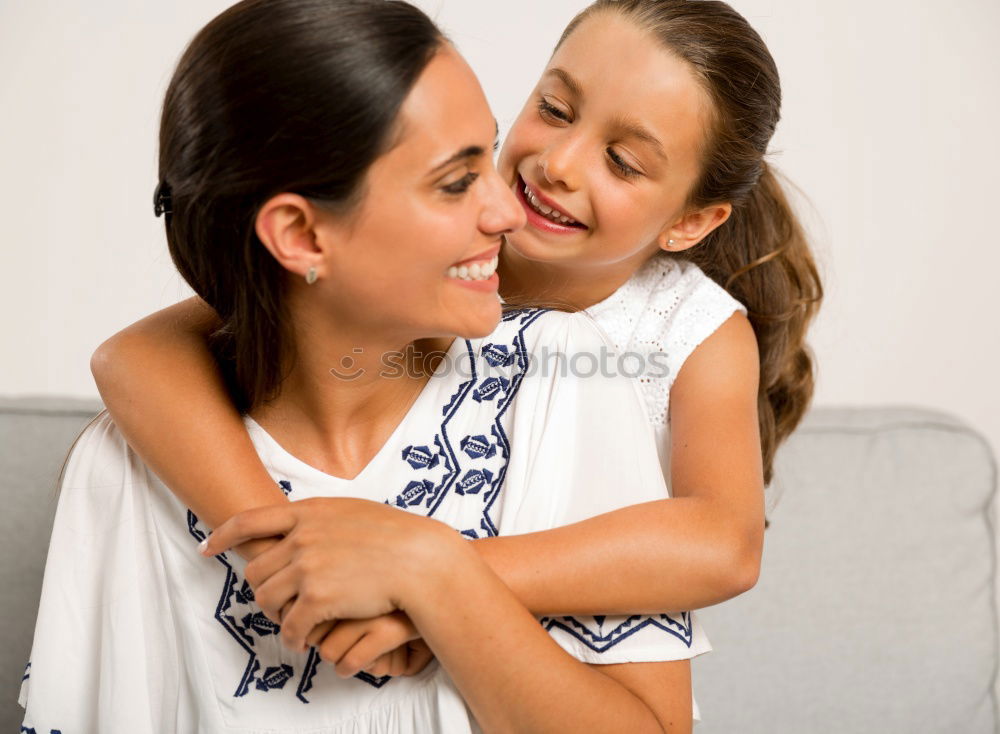 Similar – Image, Stock Photo Mother and daughter smiling and hugging outdoors