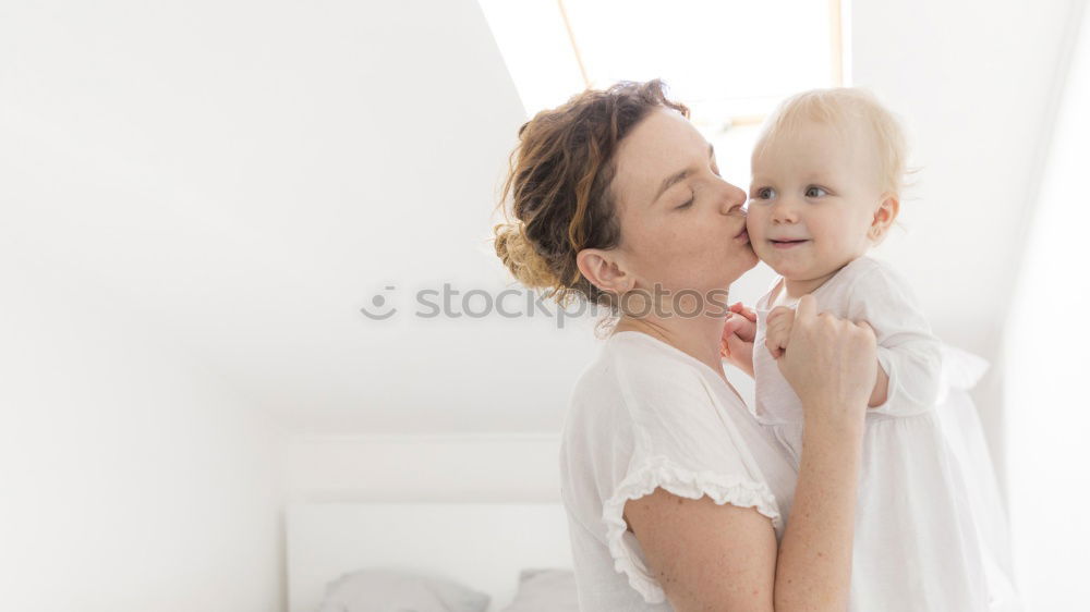 Similar – Image, Stock Photo Mother and Son cuddling at home