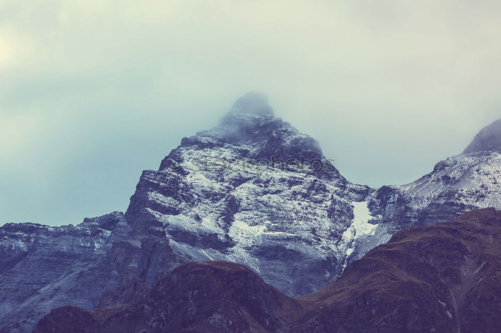 Similar – Picturesque view of snowy mountains