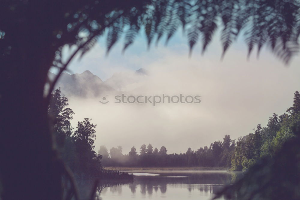 Similar – Islands in fog Alberta