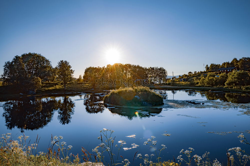 Similar – Alpine village under sun rays