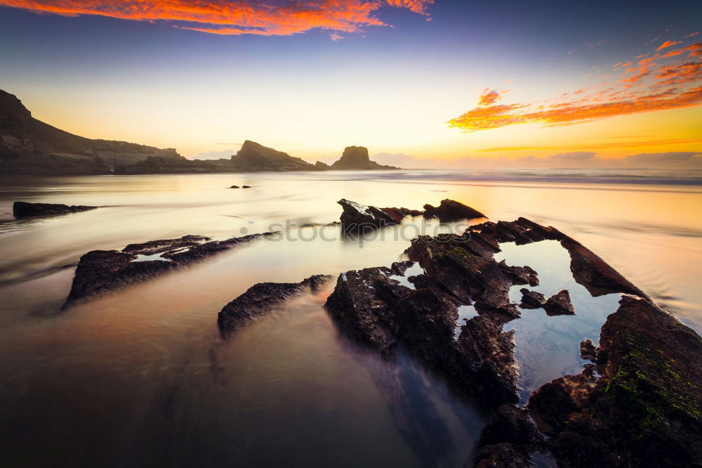 Similar – Image, Stock Photo Coast and calm sea in evening