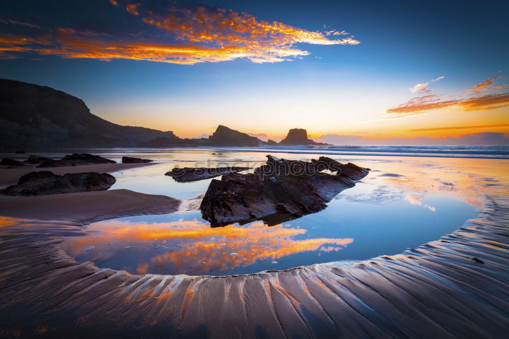 Similar – Image, Stock Photo Liapades Beach, evening atmosphere on a stony beach, waves breaking on a rock behind which the sun is setting