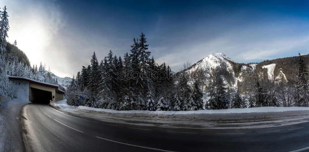 Similar – Landscape of snowy winter road with curves in the mountain