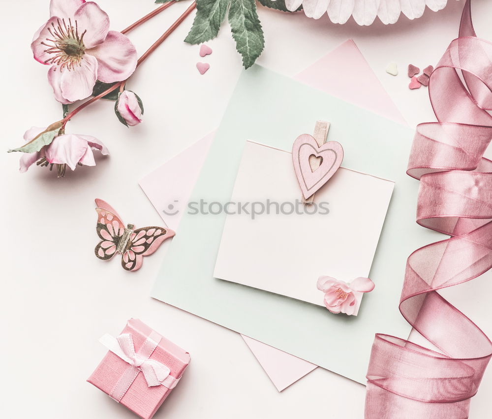 Similar – Table with cup of coffee, gift and pink tulips