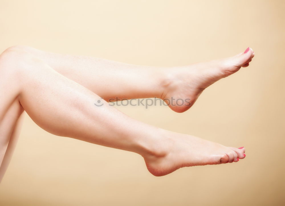 Similar – up and down Legs Feet Hang