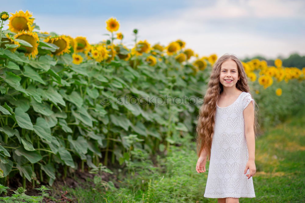 Similar – Image, Stock Photo Little girl in nature field wearing beautiful dress