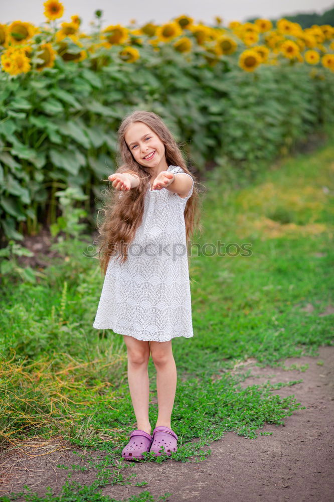 Image, Stock Photo Little beautiful girl in nature stream wearing dress