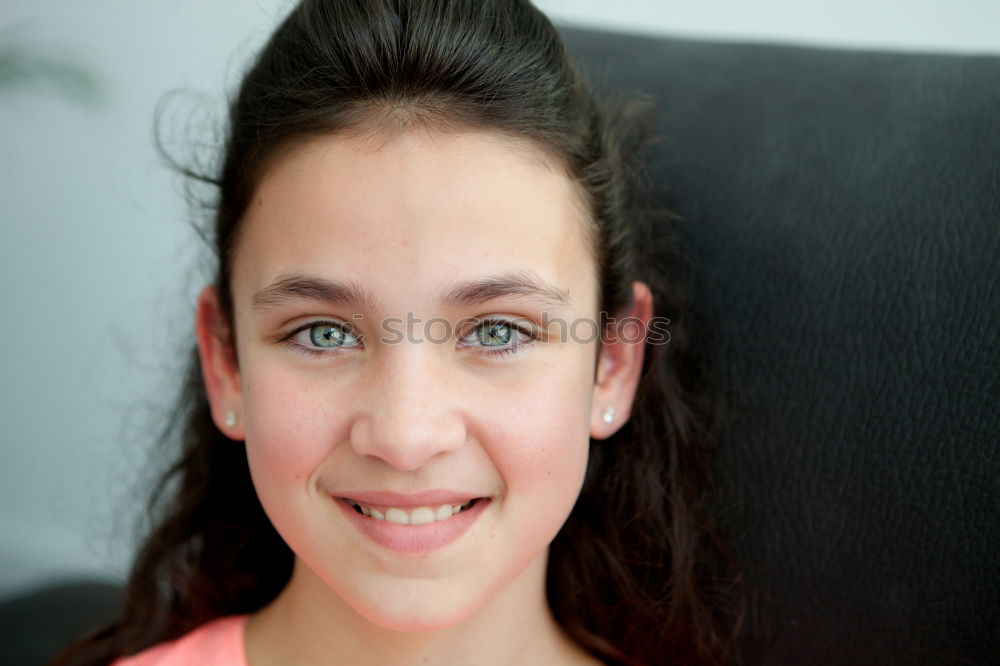 Similar – Happy preteen girl with blue eyes smiling