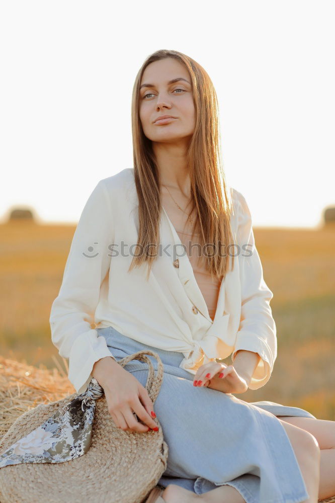 Similar – Happy girl posing on the stones of a river