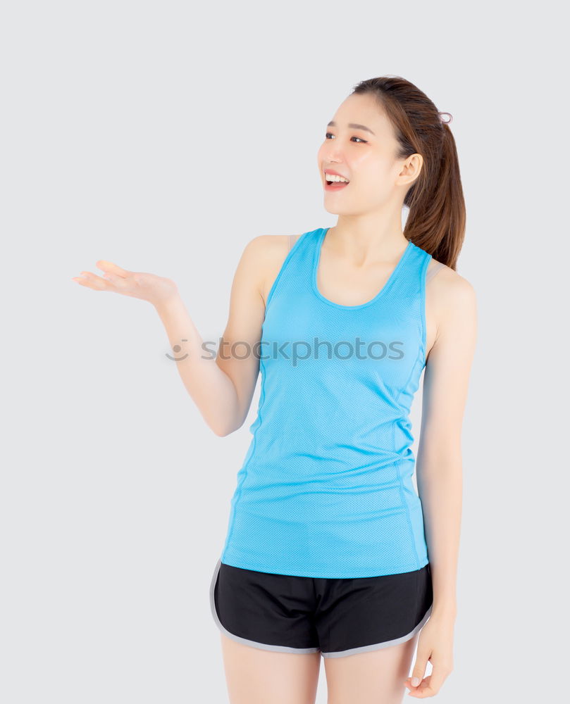 Similar – Woman tying hair in ponytail getting ready for run.