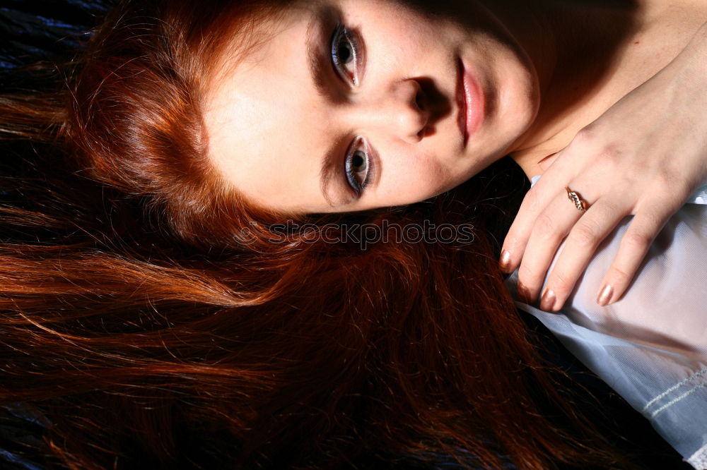 Similar – Young woman lying down in a sofa at home