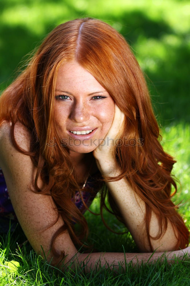 Similar – Redhead woman with blue shirt in a beautiful park