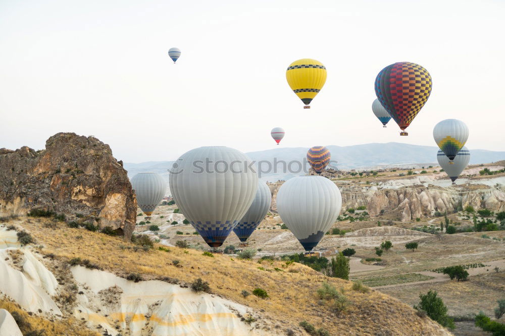 Similar – Image, Stock Photo Birds and hot air balloons above Bagan