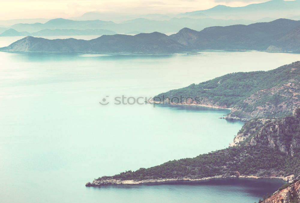 Similar – Image, Stock Photo Big mount and coastal town