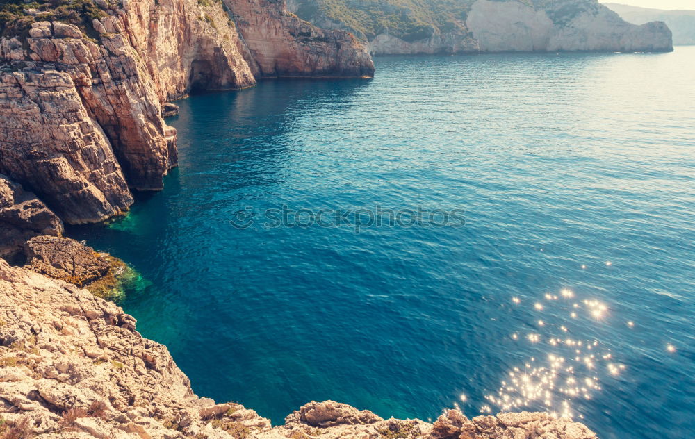 Blue sea and ship in Menorca, Spain