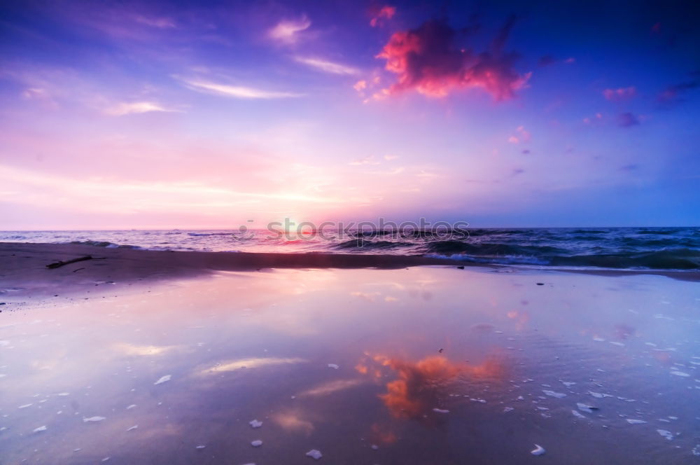 Similar – Image, Stock Photo purple sunrise over North sea beach and lighthouse, Texel