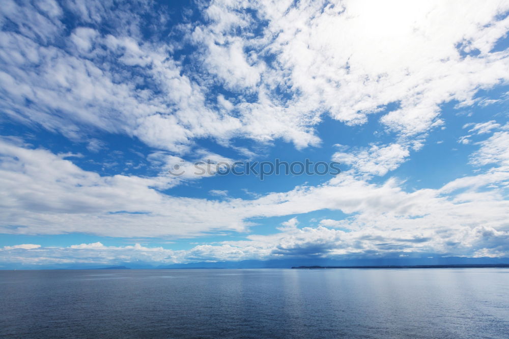 Similar – water land sky clouds