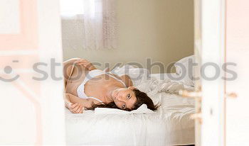 Similar – Image, Stock Photo Pretty blonde woman folded head on levitating pillow