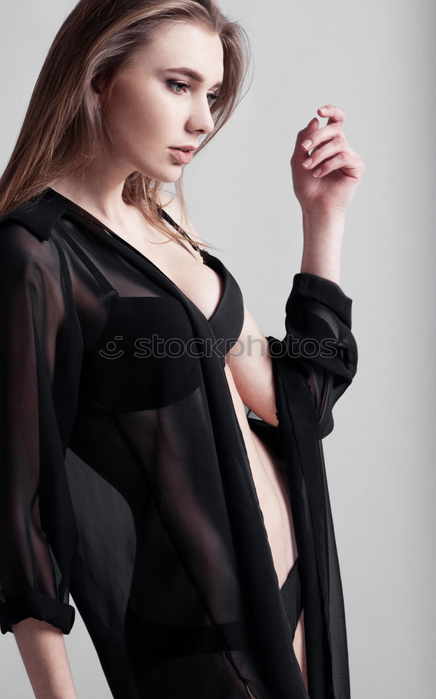 Image, Stock Photo Sexy young blond woman in black lingerie