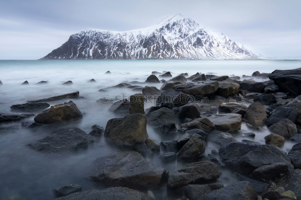 Similar – Summer cloudy Lofoten islands. Norway misty sea