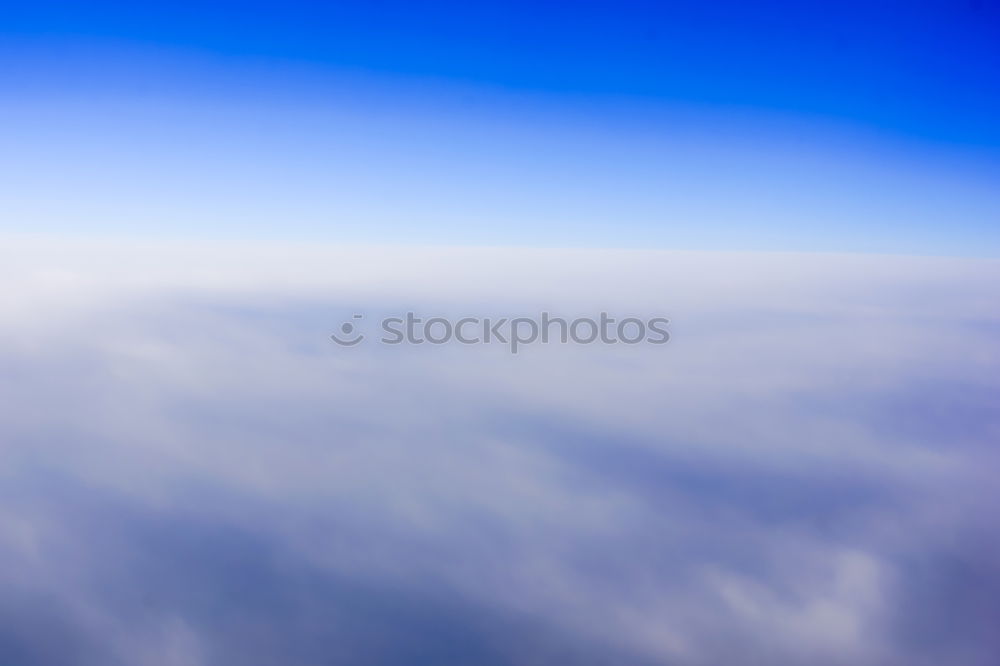 Similar – Natural background: clouds see from the airplane.