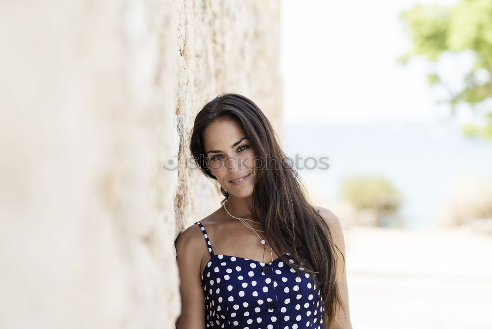 Similar – Middle aged woman on the streets of a greek village