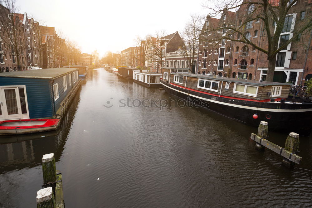 Similar – Image, Stock Photo Woman looking at sunset at one of the canals in Amsterdam