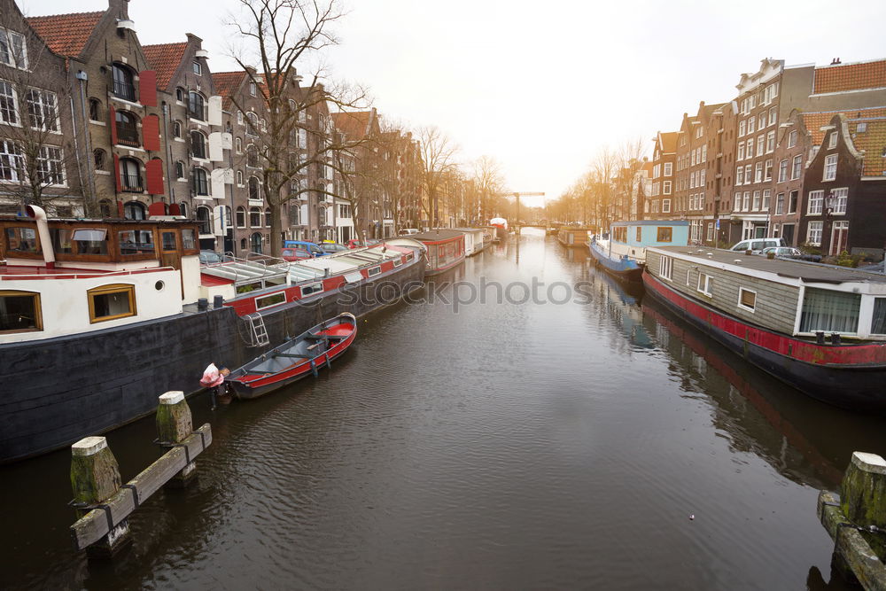 Similar – Image, Stock Photo Woman looking at sunset at one of the canals in Amsterdam