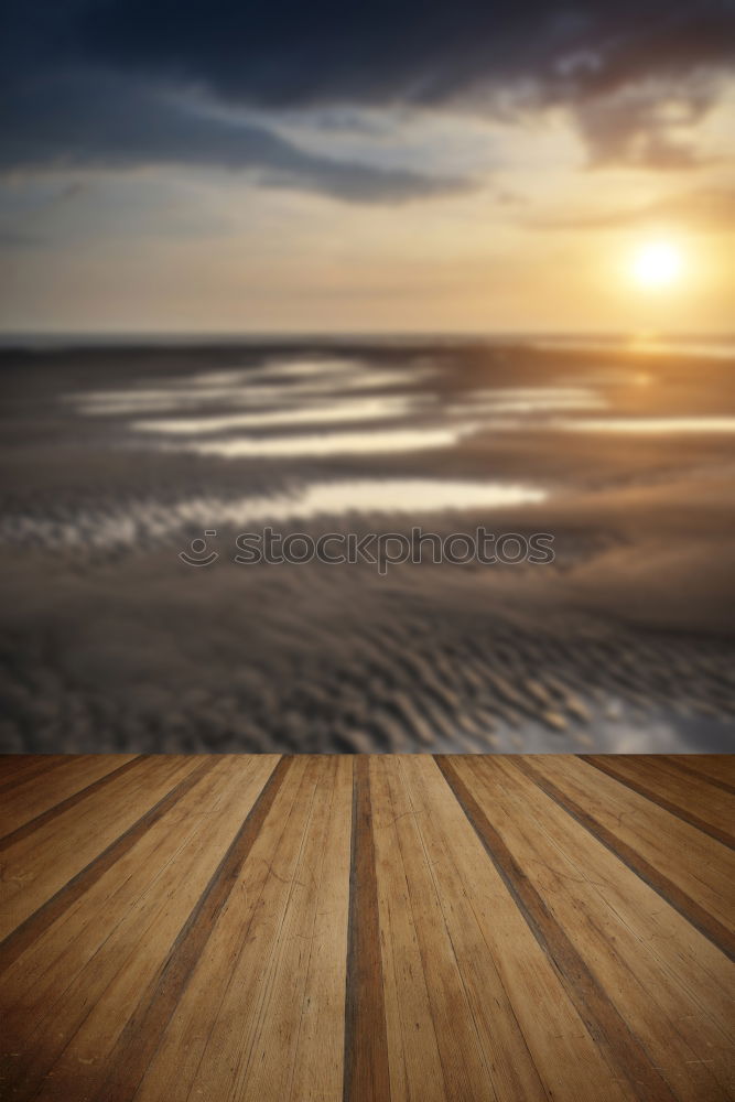 Similar – Umbrella on beach near sea