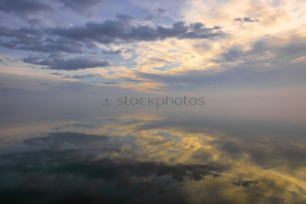 Similar – Warm twilight landscape on a beautifull cloudy sky