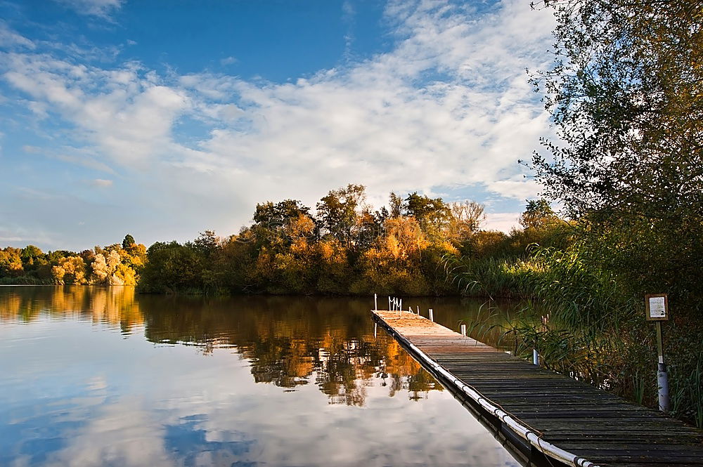 Similar – Footbridge at the lake #2