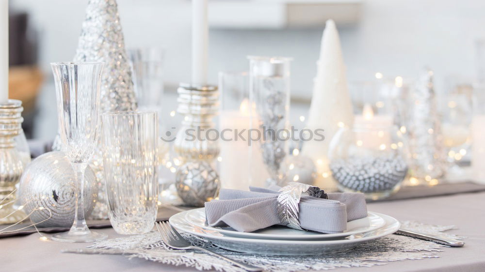 Similar – Christmas and New Year table setting in scandinavian style