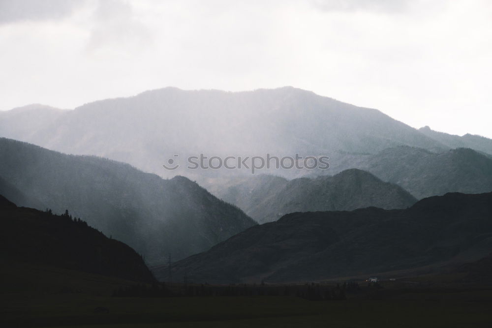 Similar – Sunny evening in mountains. Autumn village on hillsides