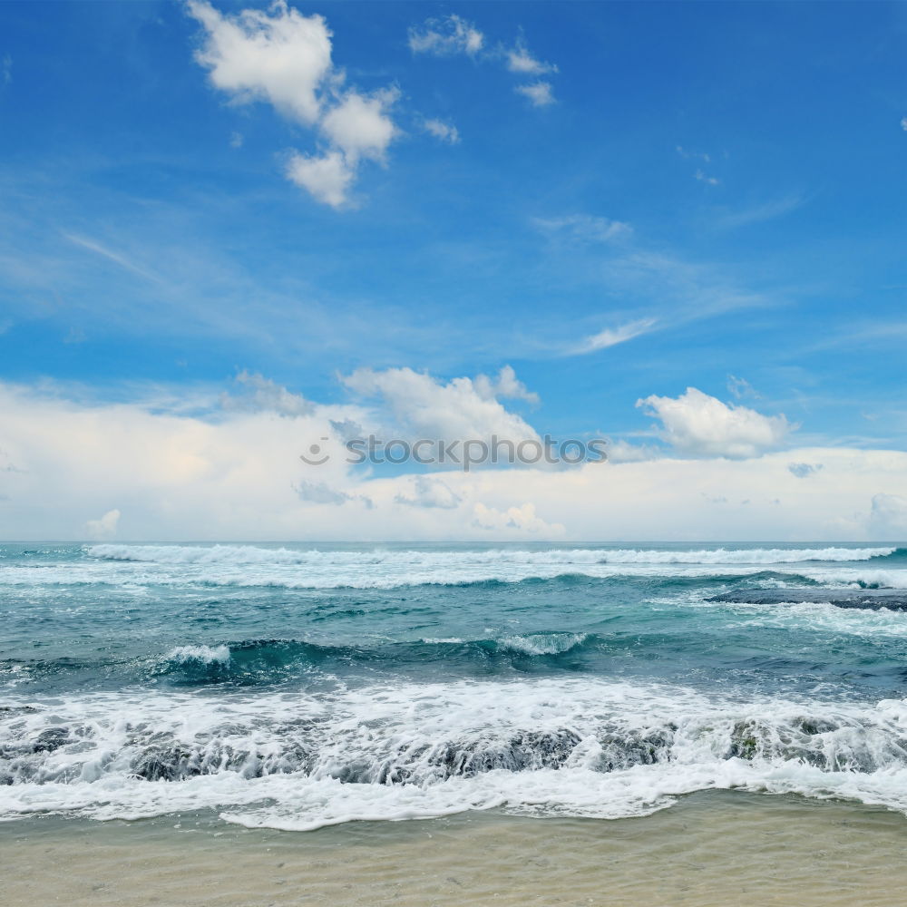 Similar – Image, Stock Photo Endless beach at Rainbow Beach. Walk left at the beach. A car is approaching. In the background a medium high mountain.