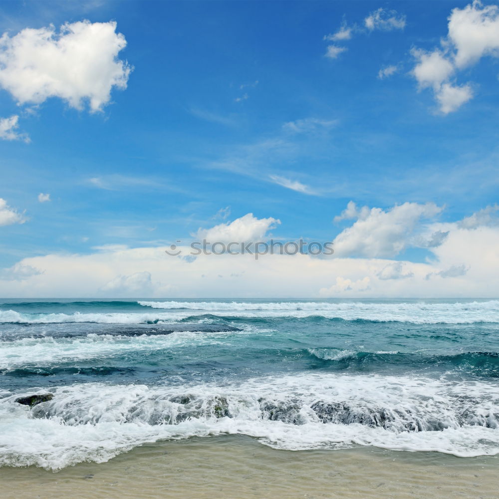 Similar – Image, Stock Photo Endless beach at Rainbow Beach. Walk left at the beach. A car is approaching. In the background a medium high mountain.