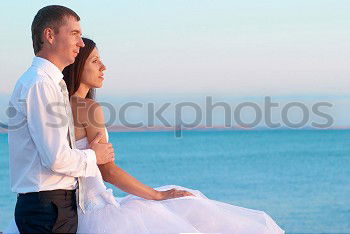 Similar – Beautiful wedding couple at the beach