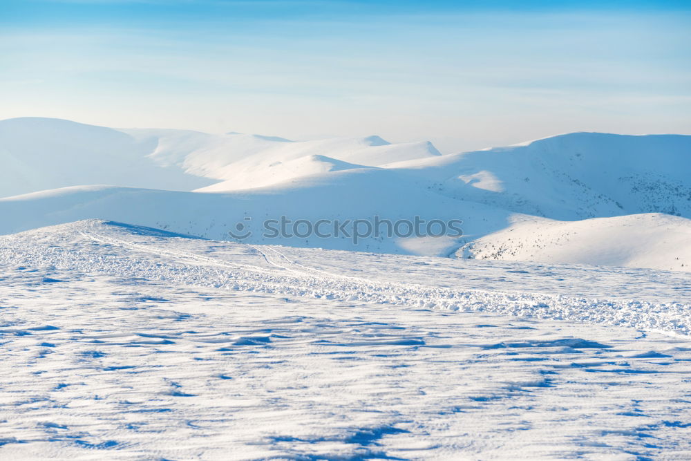 Similar – Two people in beautiful winter mountains