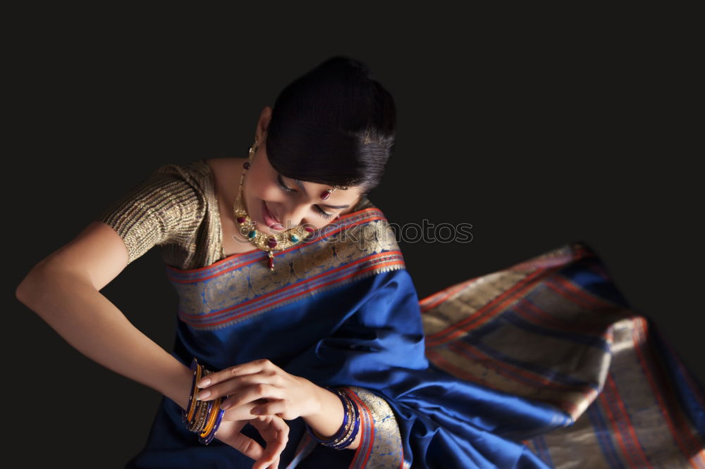 Similar – Woman fanning herself.