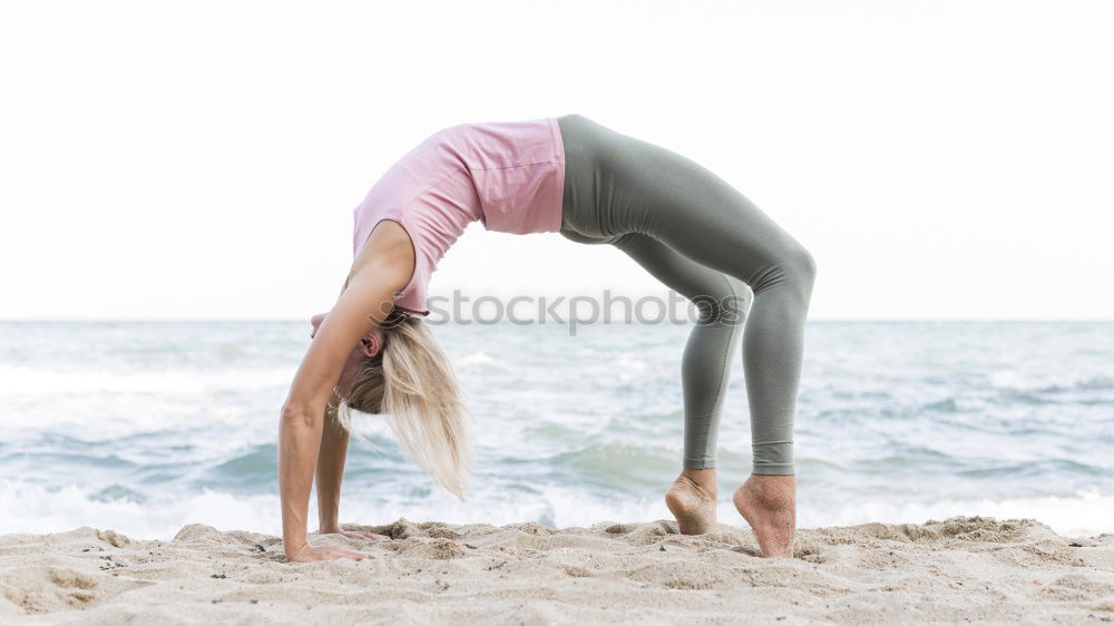 Similar – Image, Stock Photo Caucasian blonde woman practicing yoga in the beach