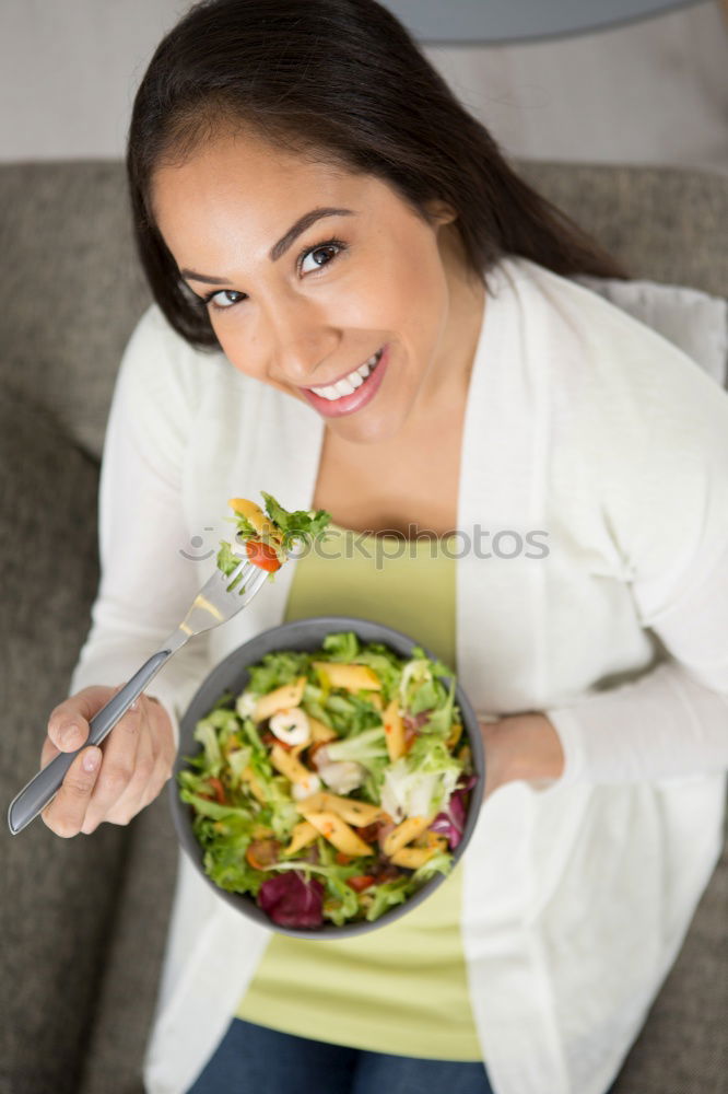 Similar – Image, Stock Photo Woman eating quinoa and vegetables in bowl