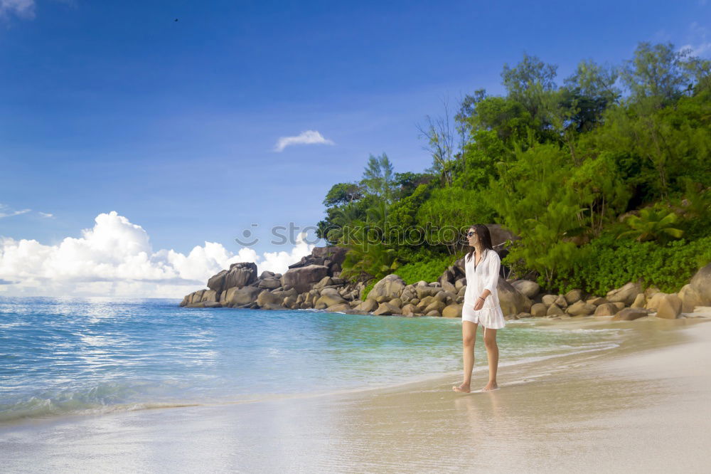 Similar – Image, Stock Photo Woman walking on sand shore near water