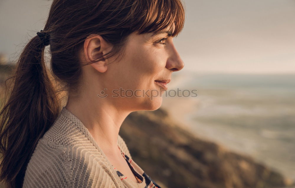 Similar – Julia, young woman looks into the distance.