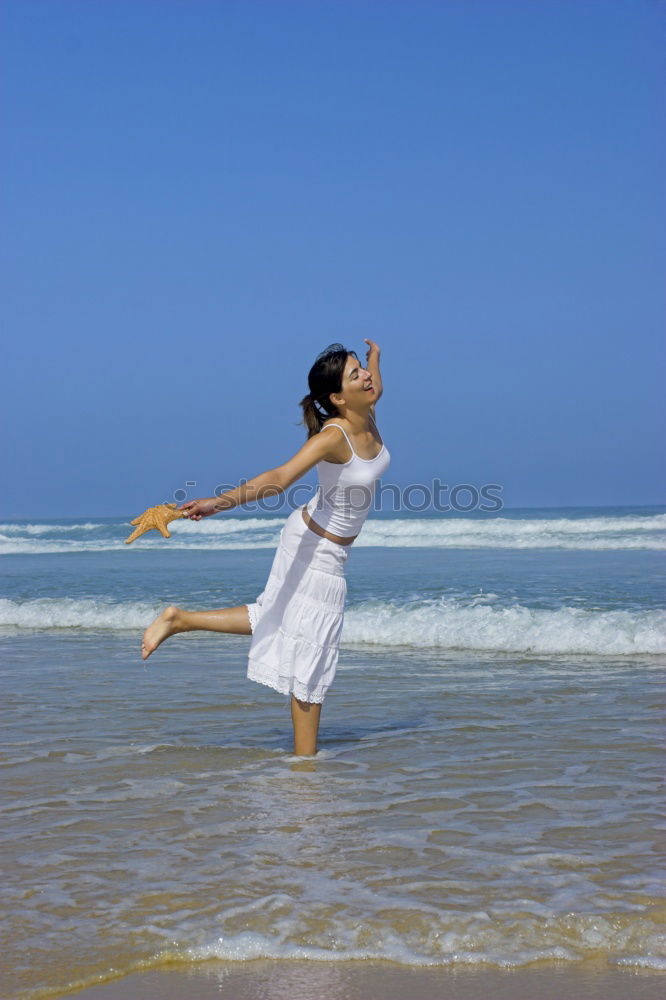 Similar – One happy little girl playing on the beach at the day time.