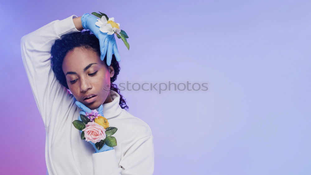 Similar – Happy young black woman surrounded by flowers