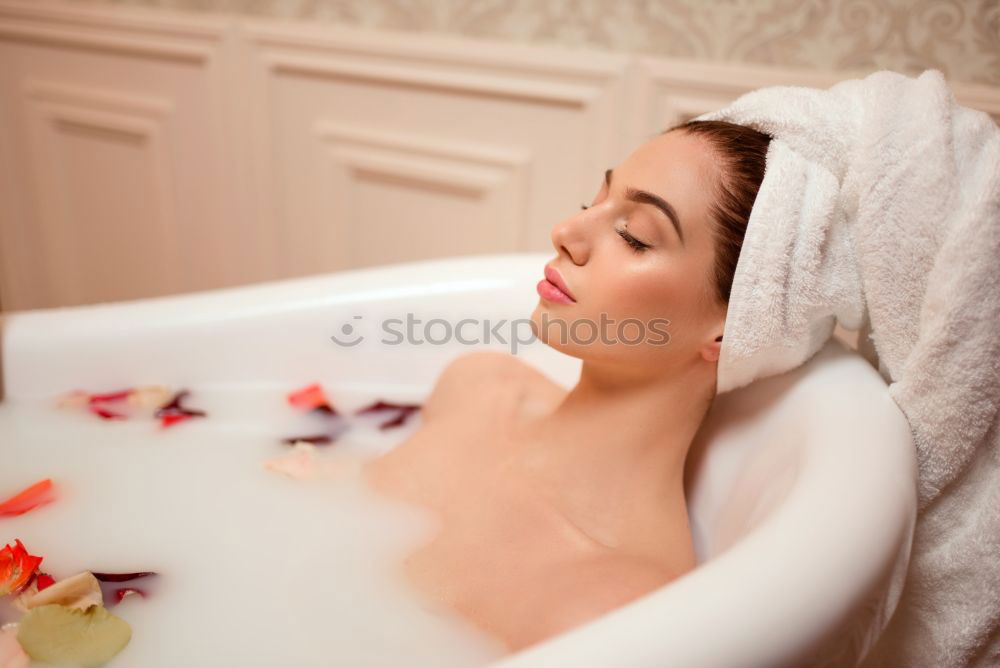 Similar – Woman lying in tub doing hydrotherapy treatment