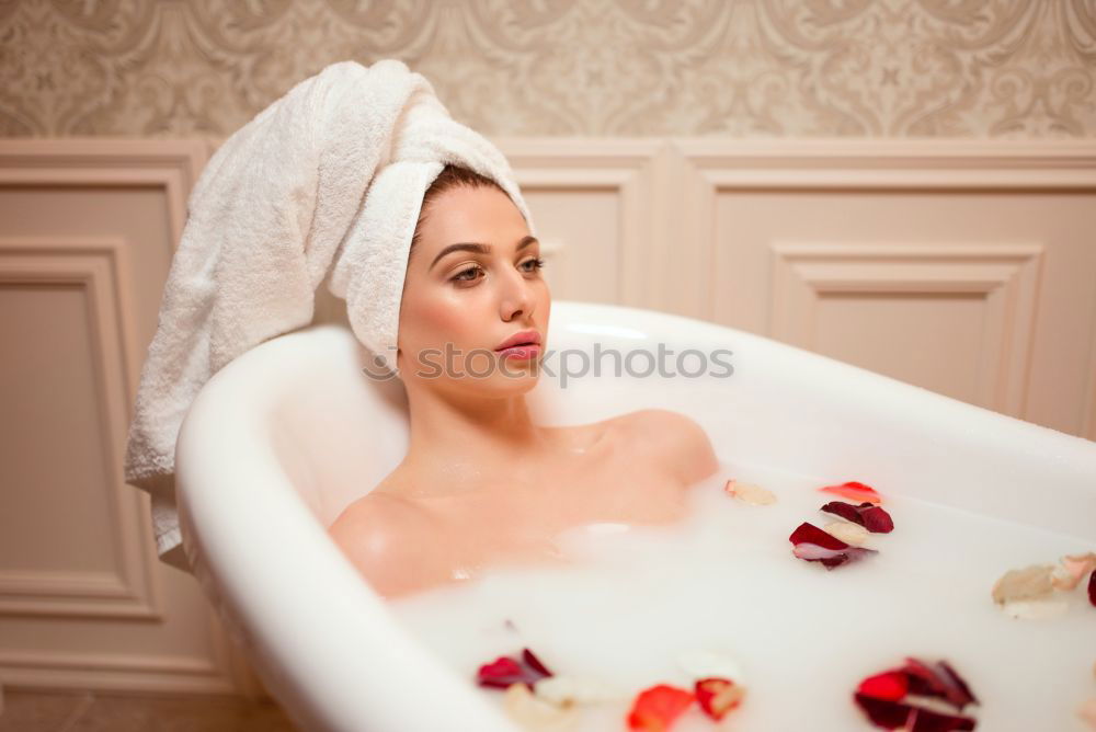 Similar – Woman lying in tub doing hydrotherapy treatment