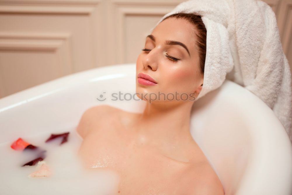 Similar – Woman lying in tub doing hydrotherapy treatment