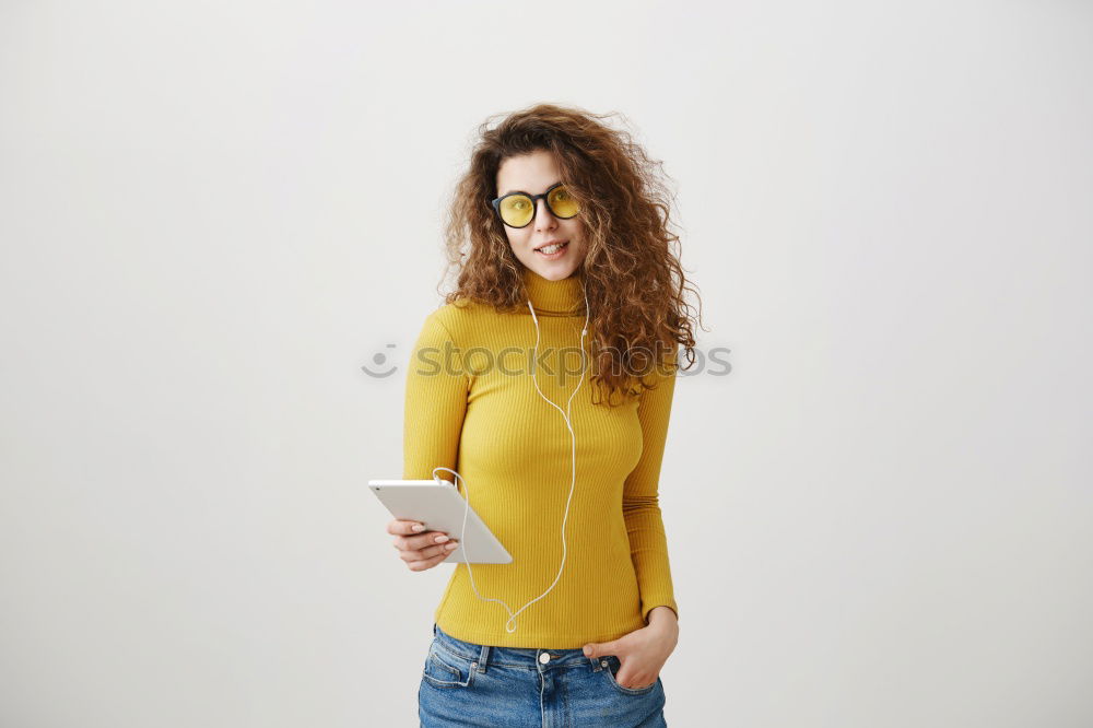 Similar – Cheerful woman in yellow jacket